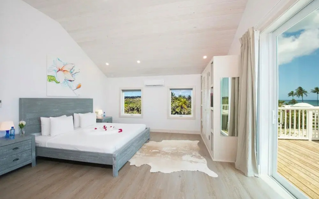 Tropical Haven: Luxurious Home Steps From Beach