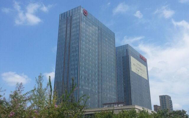 Отель Sheraton Qingdao Jiaozhou Hotel Китай, Циндао - отзывы, цены и фото номеров - забронировать отель Sheraton Qingdao Jiaozhou Hotel онлайн вид на фасад