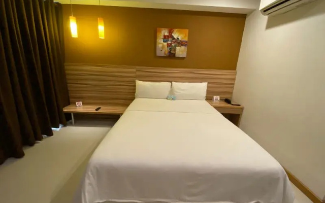 Capital O 820 Guijo Suites Makati