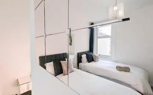 Central 3BR Home with Hot Tub Sleeps 10