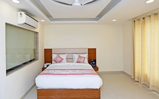 Capital O 12674 Hotel Grand Suites