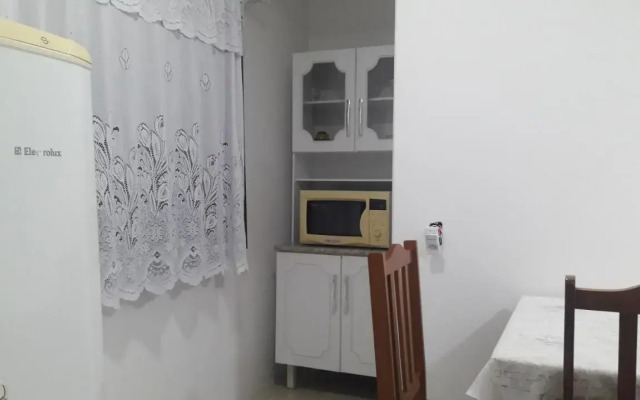 Casa 01 Dorm Terreno Compartido