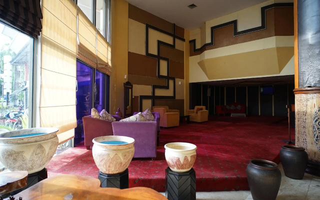 Capital O 1963 Hotel The New Benakutai