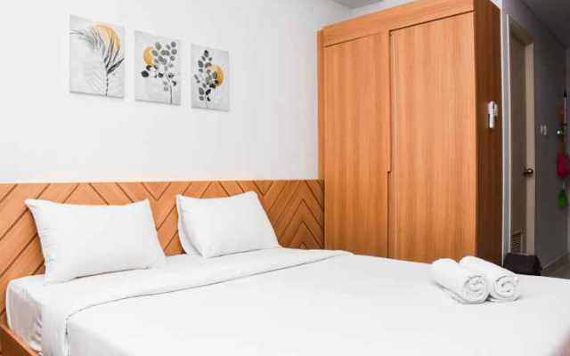Pleasant Studio near Station at Patraland Urbano Apartment By Travelio