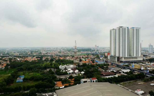 Studio Room Azalea Suites Apartment By Travelio