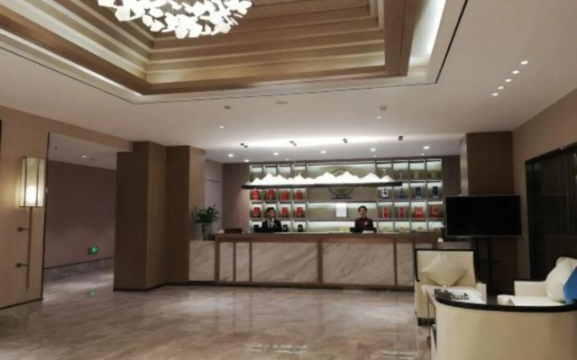 Xinzheng Xingangwanhua Hotel