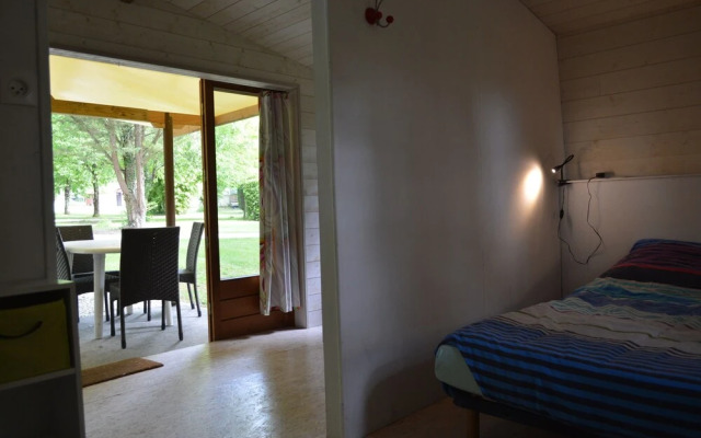 Camping Le Petit Lion - Lodges Bois