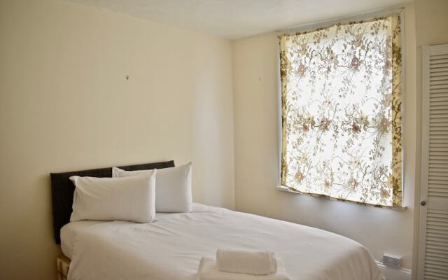 Отель Cosy Flat Minutes From Central Brighton Брайтон комната для гостей