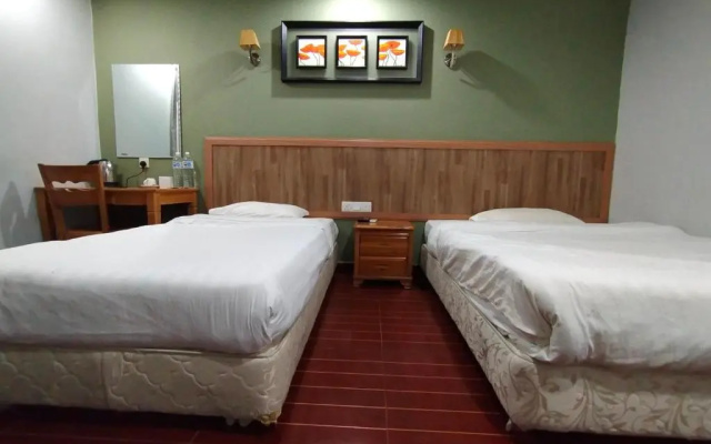 OYO 90248 Kapitan Inn