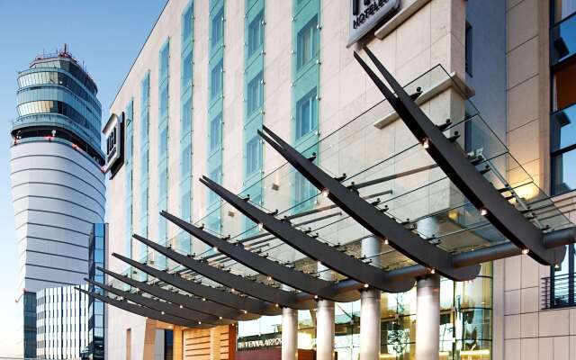 Отель NH Vienna Airport Conference Center Австрия, Вена - 9 отзывов об отеле, цены и фото номеров - забронировать отель NH Vienna Airport Conference Center онлайн вид на фасад