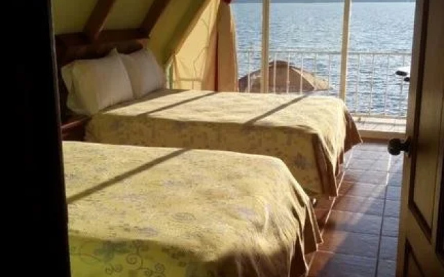 Cabañas y Habitaciones El Malecón