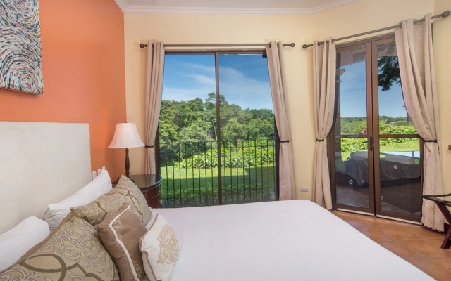 Peek-a-Boo Ocean view Condo at Reserva Conchal
