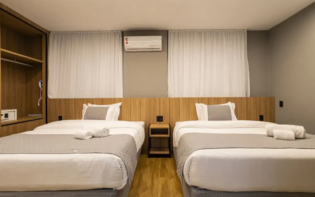 You Stay at Vila Olimpia - The World