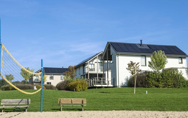 Child-friendly villa with stove, located in a lake area