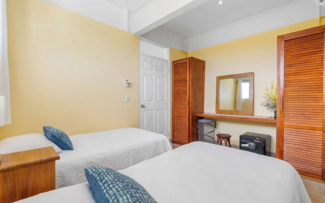 Modern Top-Floor Condo with Panoramic Views and Community Pool