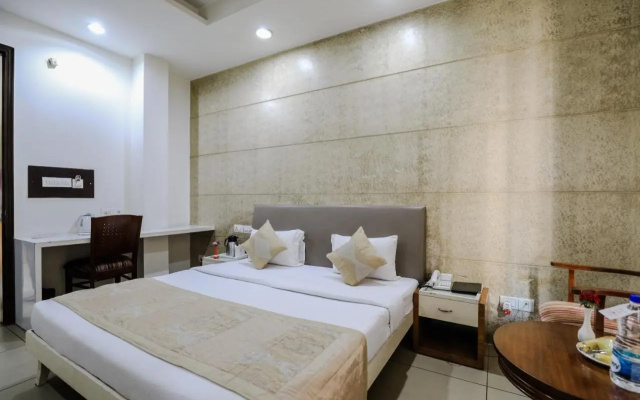 Cosy Grand @Chanakyapuri by The Cosy Hotels.