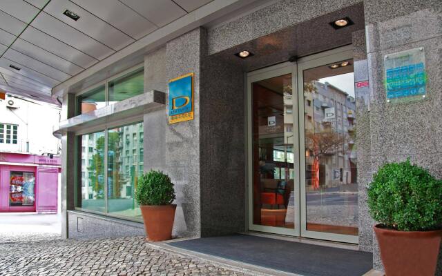 Dom Carlos Liberty Hotel вид на фасад