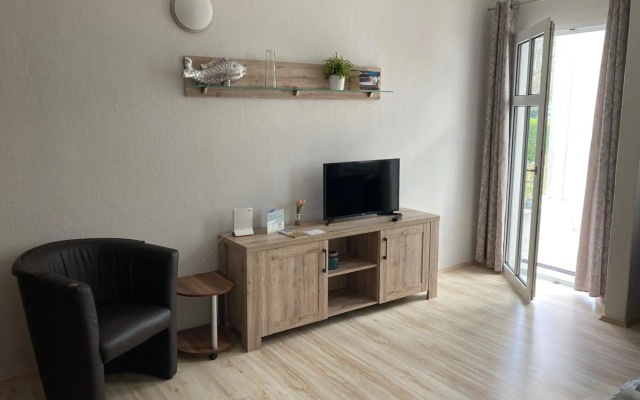 Ferienwohnung 4 Rosenbogen - Familienwohnung mit Wintergarten und Terrasse