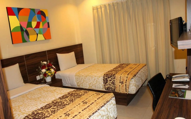 Capital O 203 Prasada Mansion Sudirman
