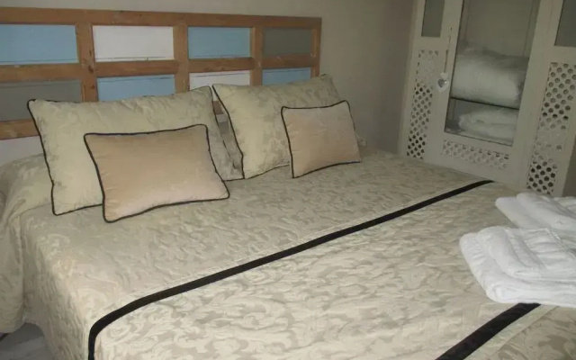 Apartamento Bizcocheros con piscina y jardin