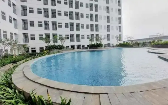 Cozy and Chic Studio at Serpong Garden Apartment By Travelio