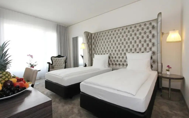 Отель Arcotel John F