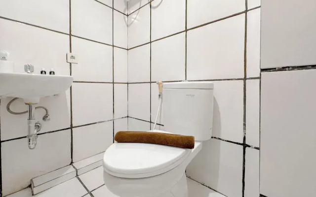 Combined Grey Toned 2Br Apartment At The City Square Surabaya