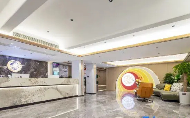 Jiangling Shiguang Hotel (Yidu Xunlong Water Street Branch)
