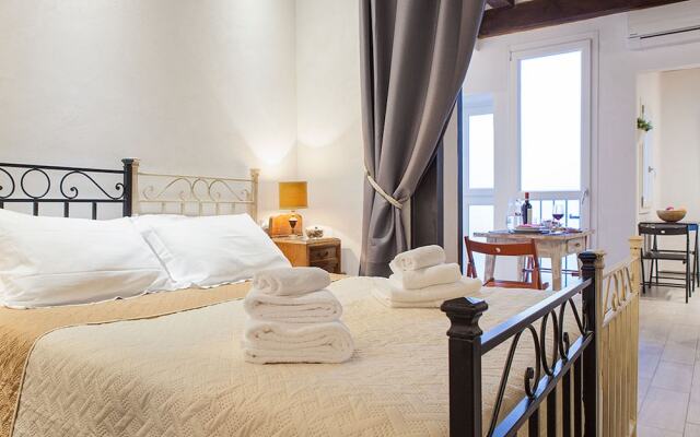 Апартаменты Santa Croce Apartment Флоренция комната для гостей