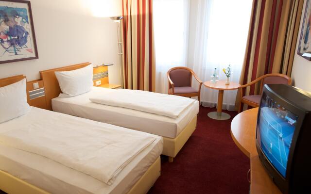 Отель Wyndham Garden Dresden Дрезден комната для гостей