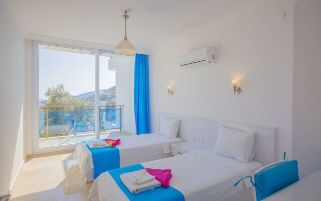 Villa Goktepe 1 by Akdenizvillam Турция, Калкан - отзывы, цены и фото номеров - забронировать отель Villa Goktepe 1 by Akdenizvillam онлайн комната для гостей