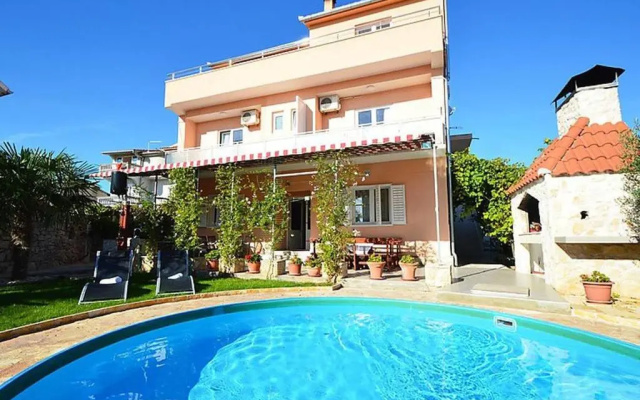 Three Apartment Complex With Pool