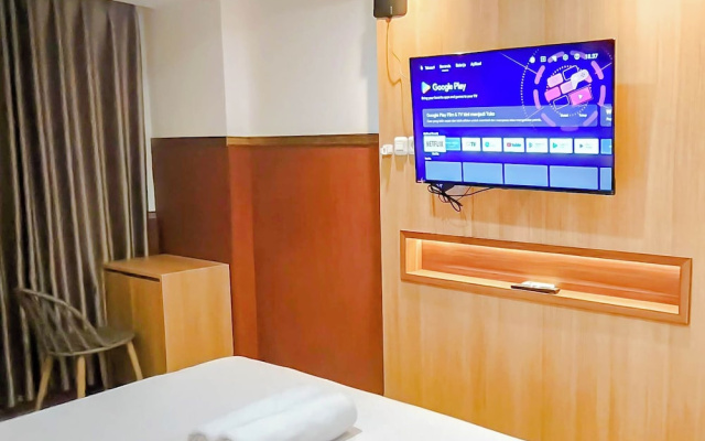 Wooden Touch Studio At Tamansari Skylounge Makassar Apartment