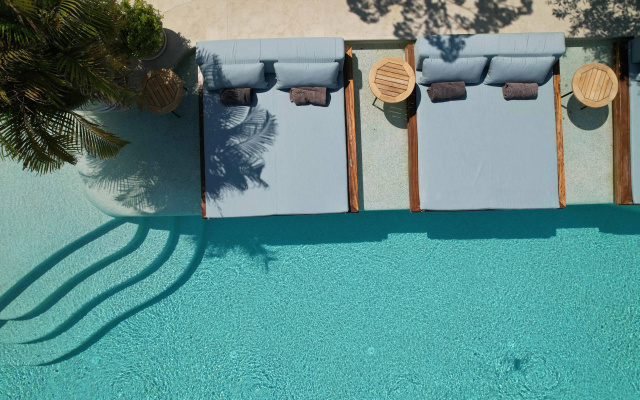 Отель Pilos Suites
