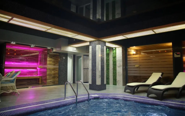 Отель Dilimah Premium Luxury