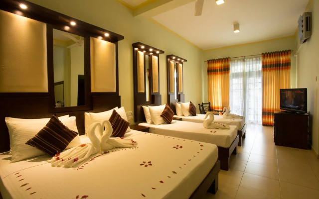 Отель Oak Ray Serene Garden Hotel