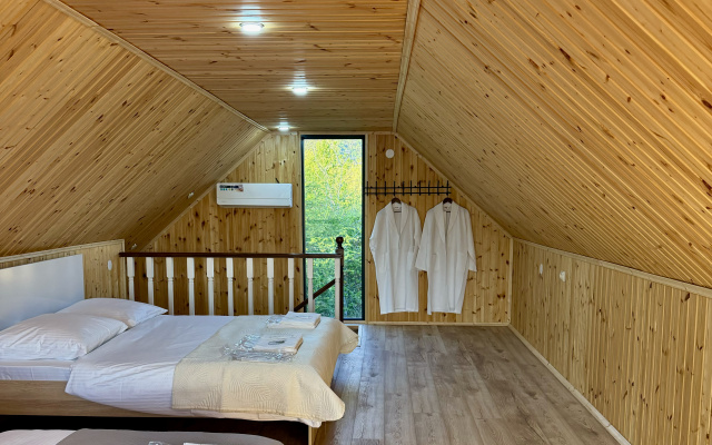 Курортный отель Akhan Resort Gagra - Виллы у реки с видом на горы возле моря