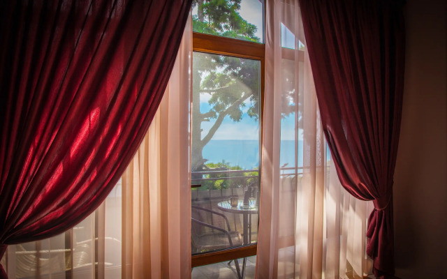 Гостиница Гостевой Дом Аю-Даг в Партените отзывы, цены и фото номеров - забронировать гостиницу Гостевой Дом Аю-Даг онлайн Партенит комната для гостей