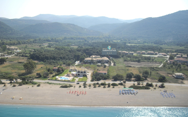 Отель Karavostasi Beach