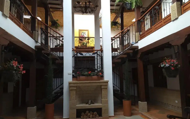 Отель Jardines de la Villa