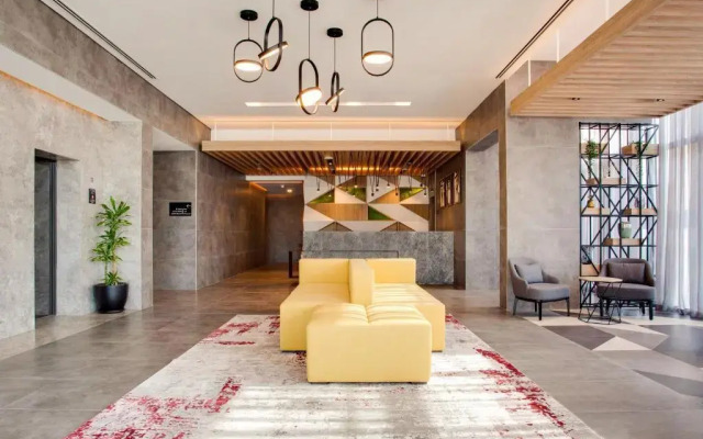 Отель Lemon Tree Hotel Jumeirah Dubai