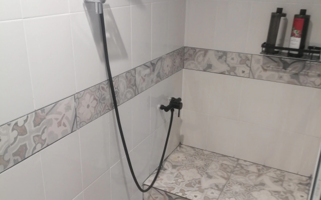 Меблированные комнаты в Коттедже с лужайкой