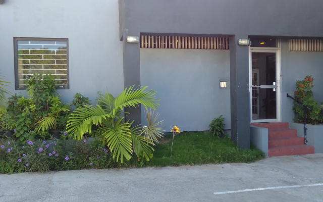 Отель Pogas Suites