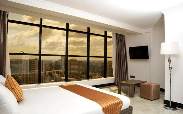 Отель Golden Tulip Dar City Center