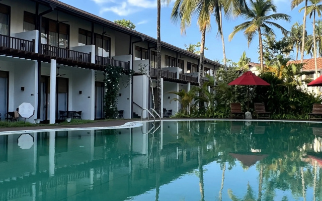 Курортный отель Palm Garden Ayurveda Resort