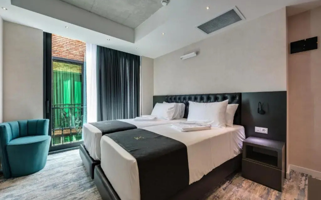 Standard Twin room (twin beds) · Mit Tbilisi Hotel — photo 1
