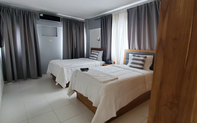 Отель Boca Grande Suites