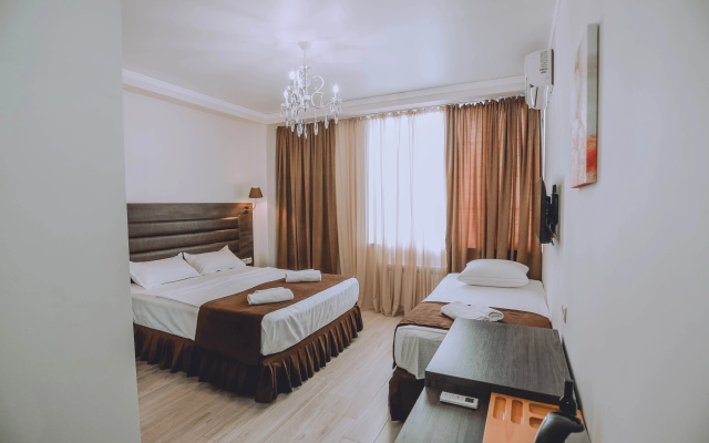Family Suite with sea view · Royal Medis Hotel — photo 1