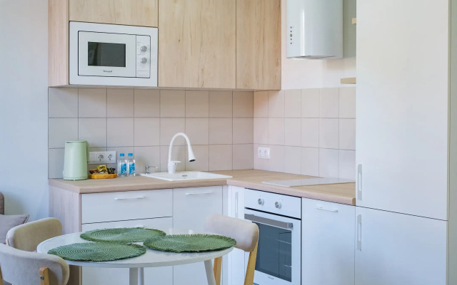 Квартира Уютная и новая студия в Кудепсте