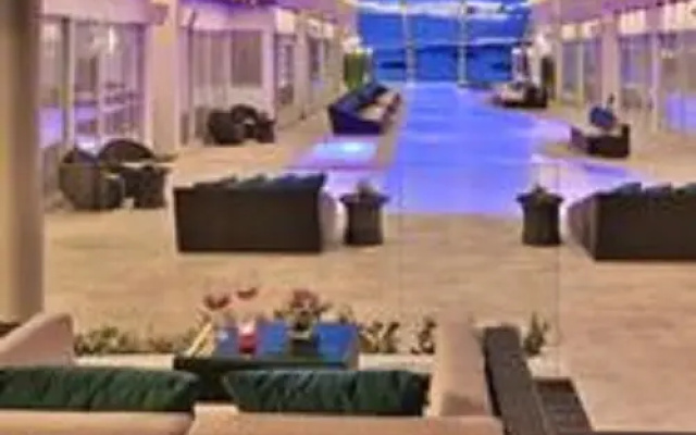 Отель The Privilege Ezra Beach Club